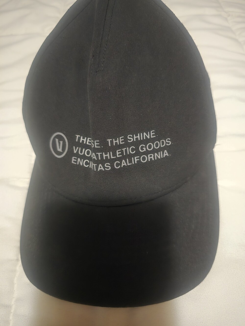Vuori Black Baseball Cap with White Logo Text